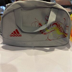 Adidas Gray Cosmetic Bag with Red and Yellow Accents